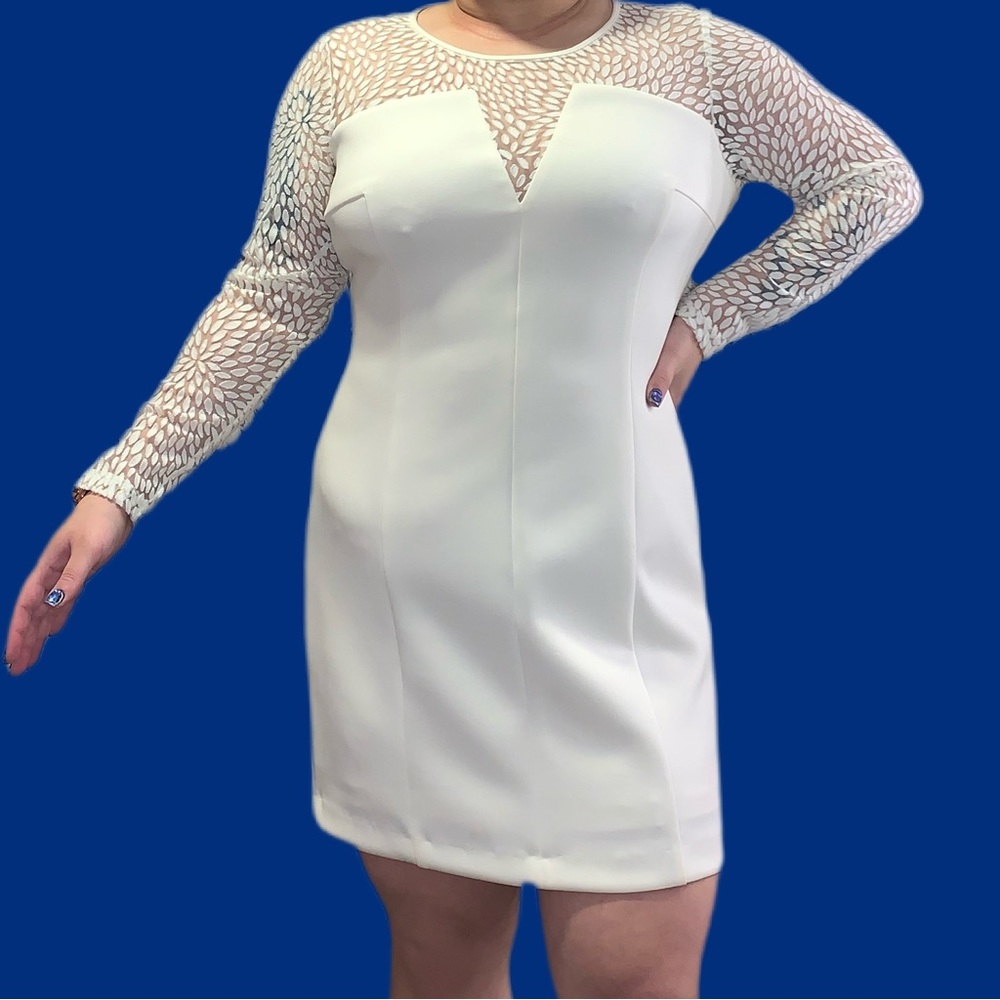 White Calvin Klein dress with lace sheer sleeves. Straight dress size 16.